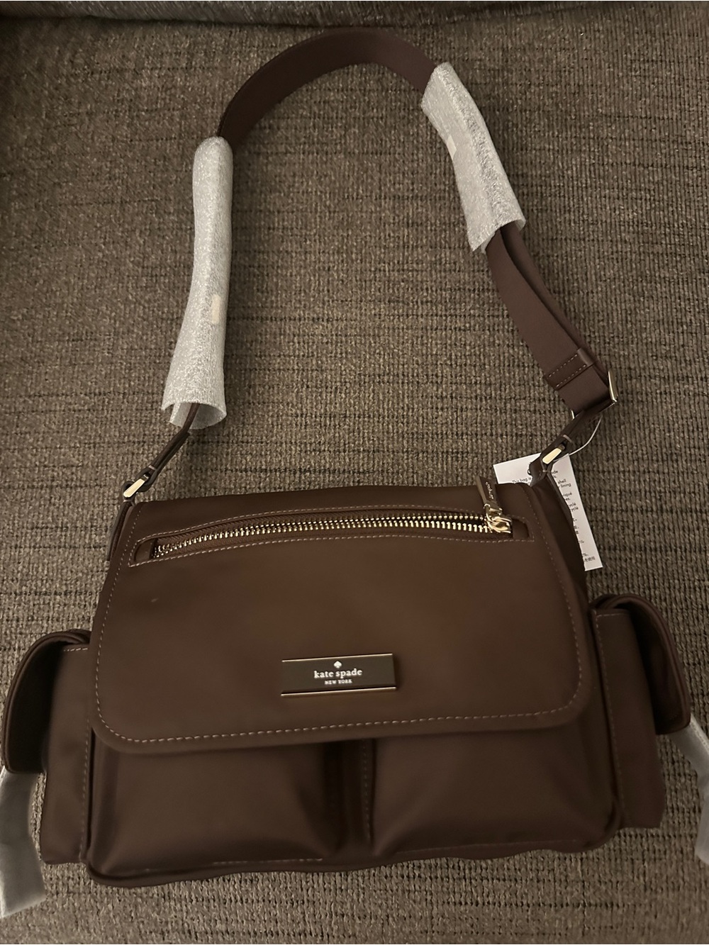 Kate Brown Crossbody with Gold Accent Zip. Brand New with Tags, Never used!